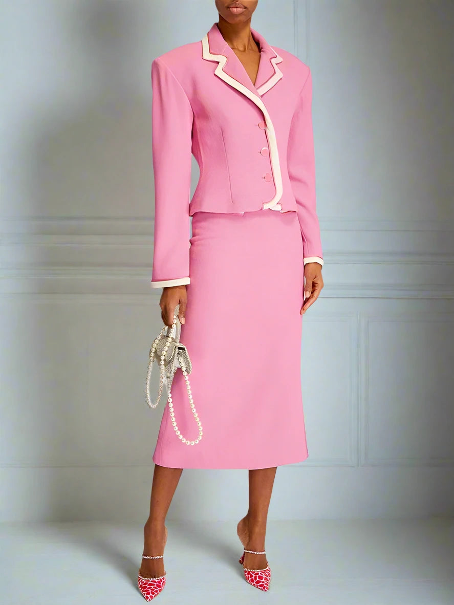 Professional women's pink suit set with blazer and pencil midi skirt on model