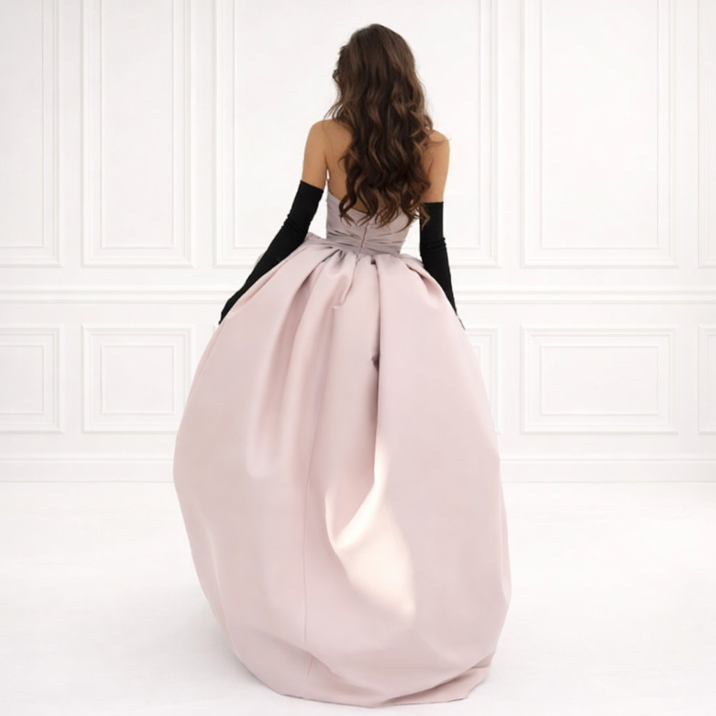 Back view of pink strapless ball gown