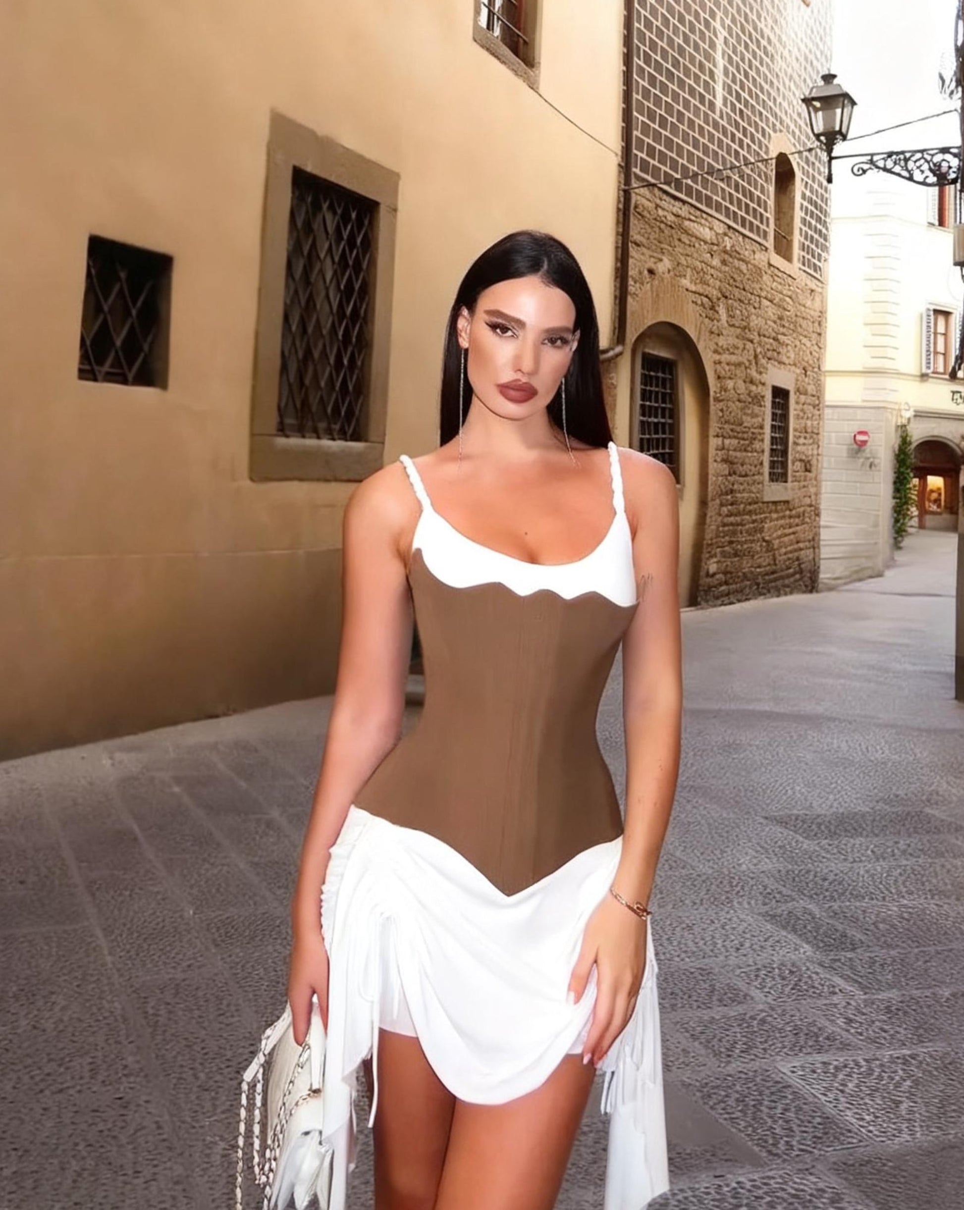 Front view of Laced-Up Corset Mini Dress in Brown with braided shoulder straps and draped skirt panels