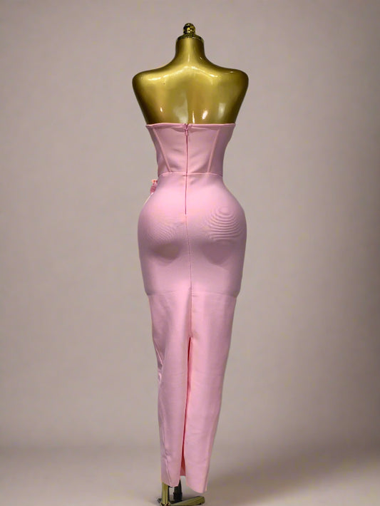 Back view of strapless flower appliqué bandage dress