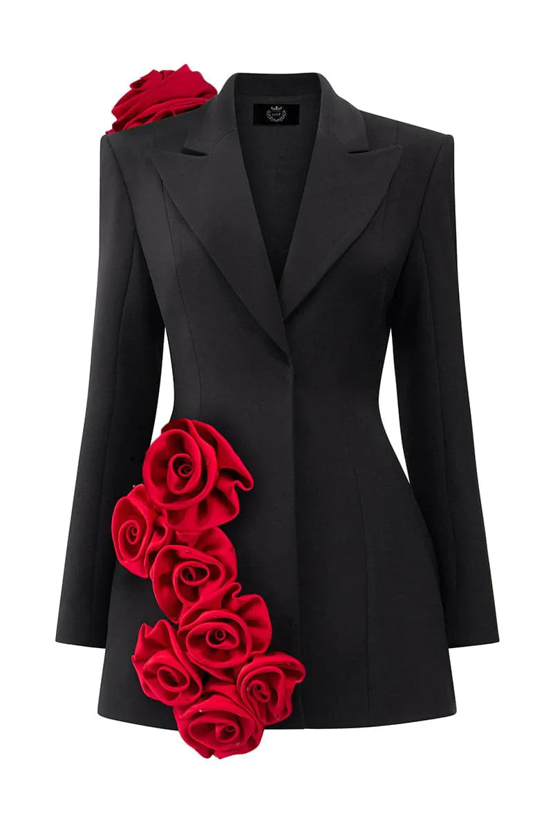 Front view of black blazer dress with red flower details displayed on dress form