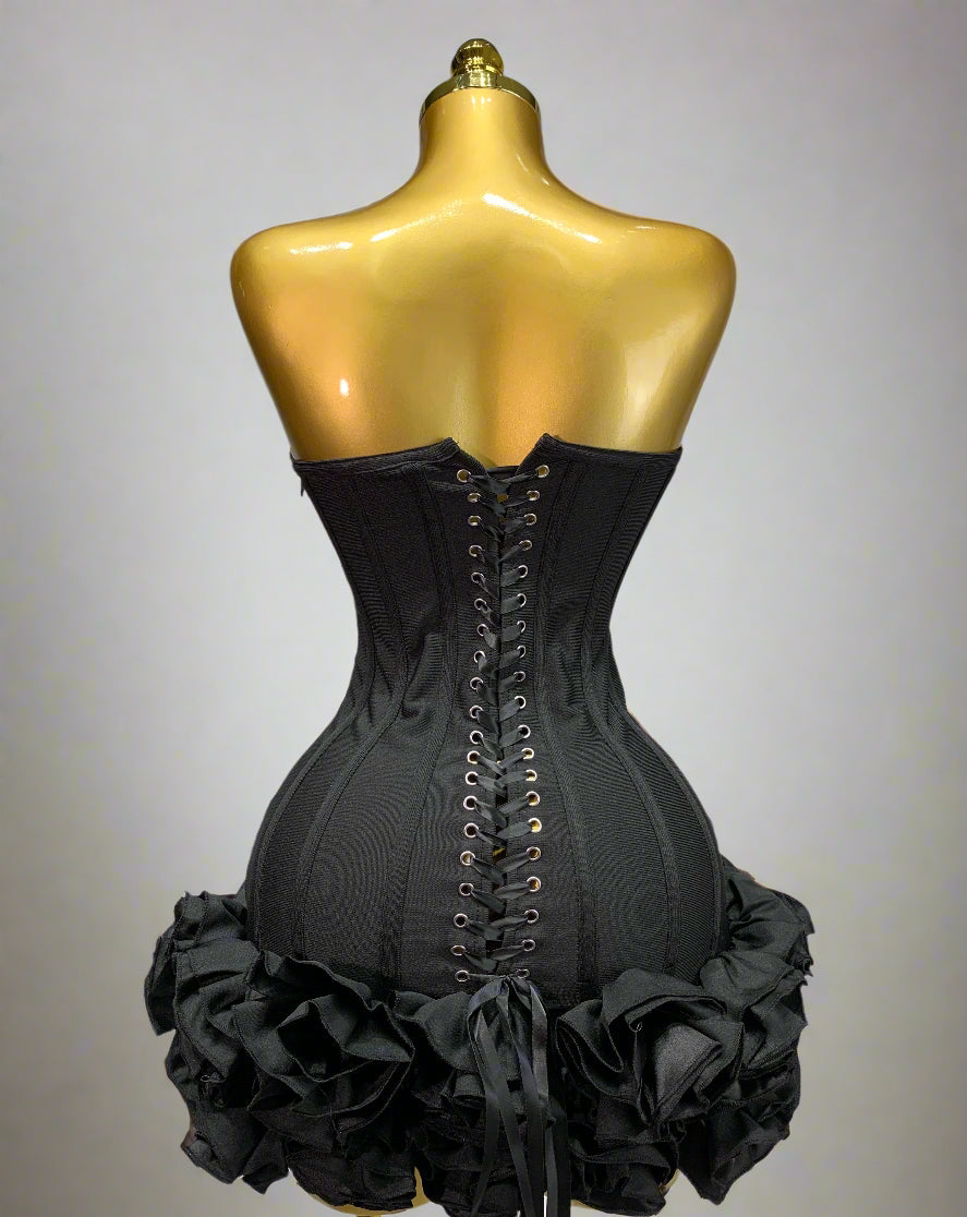Back view of strapless cocktail mini dress in black