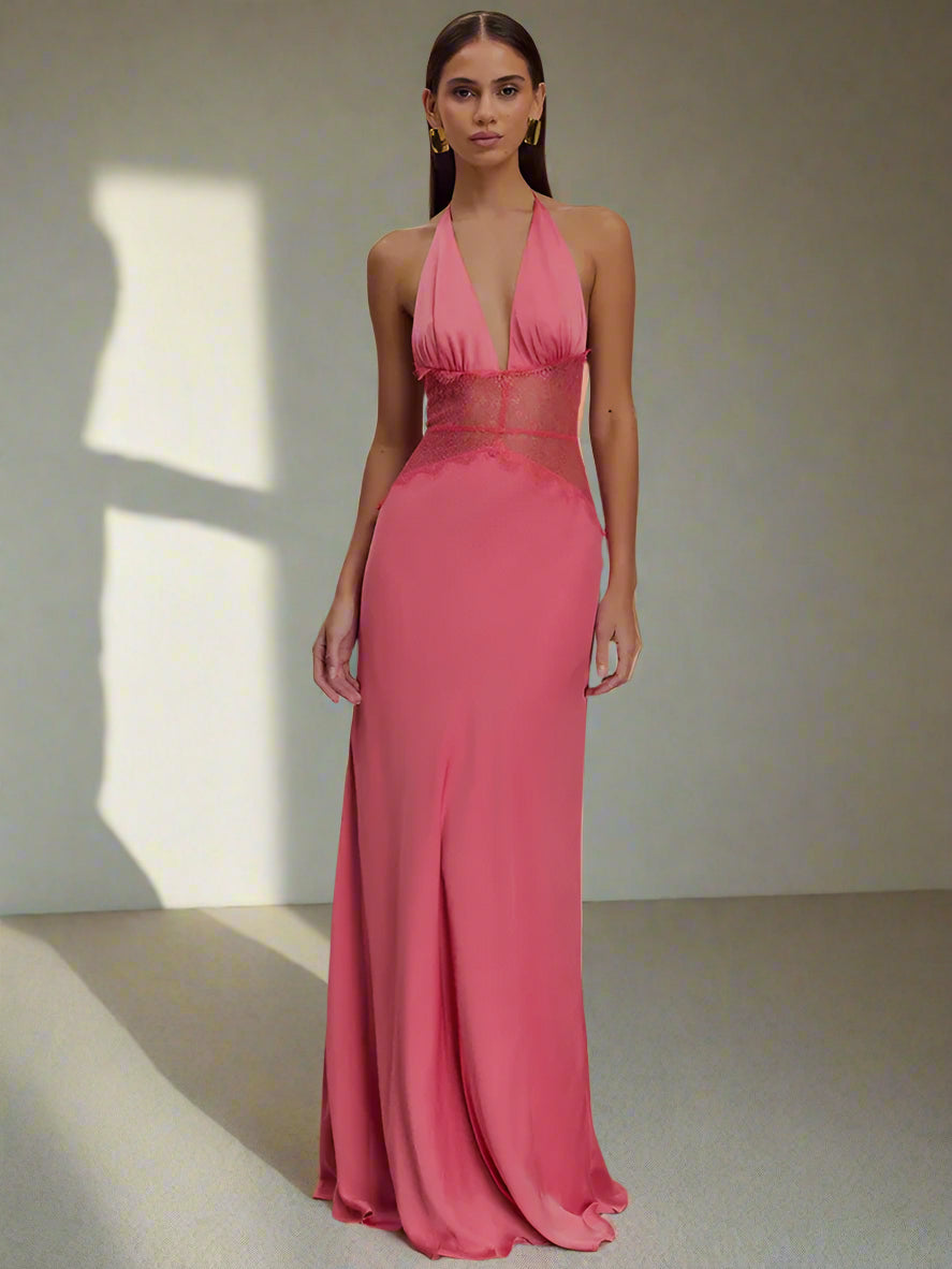 Model wearing glamorous backless lace halter maxi dress for formal occasions