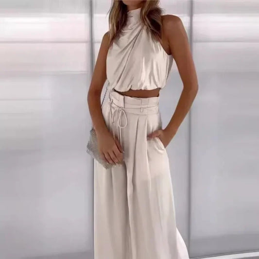 Pleated wide leg pants and crop top set in cream with elastic waist and sleeveless design
