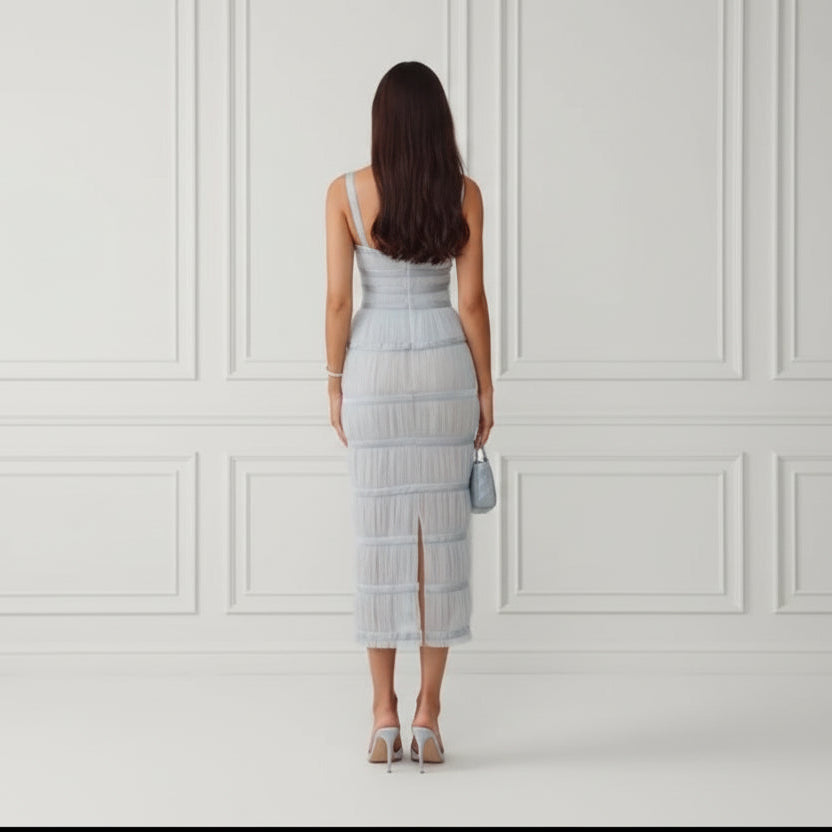 Back view of baby blue midi dress showing zipper closure