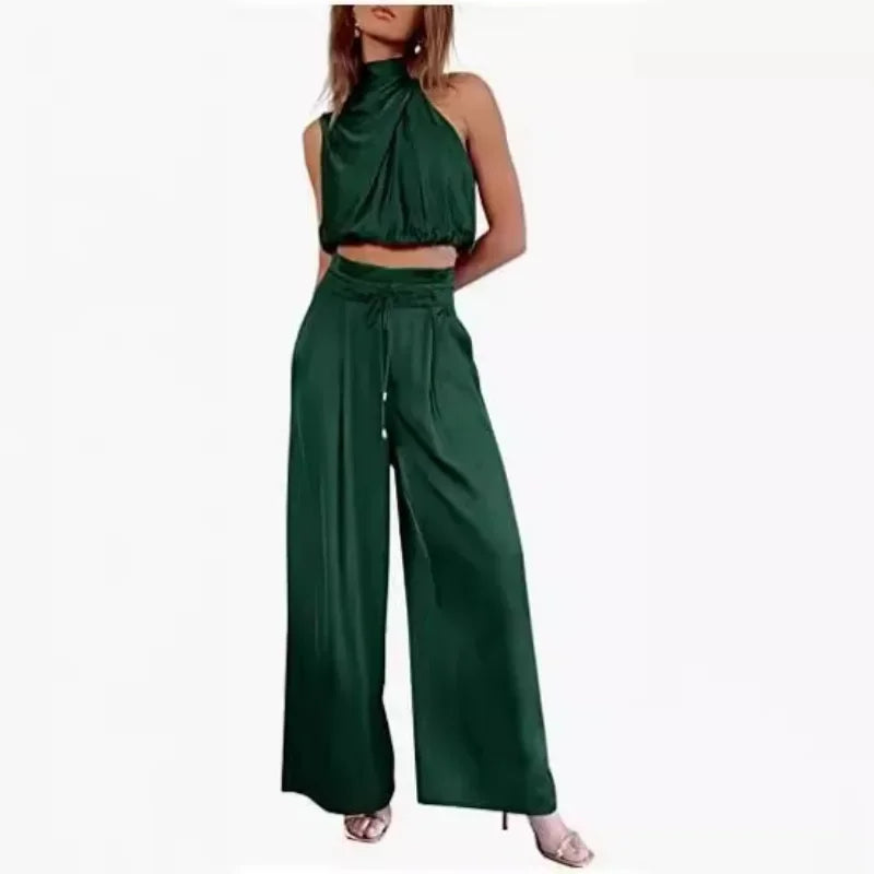 Casual two-piece set with pleated wide leg pants and fitted crop top"
