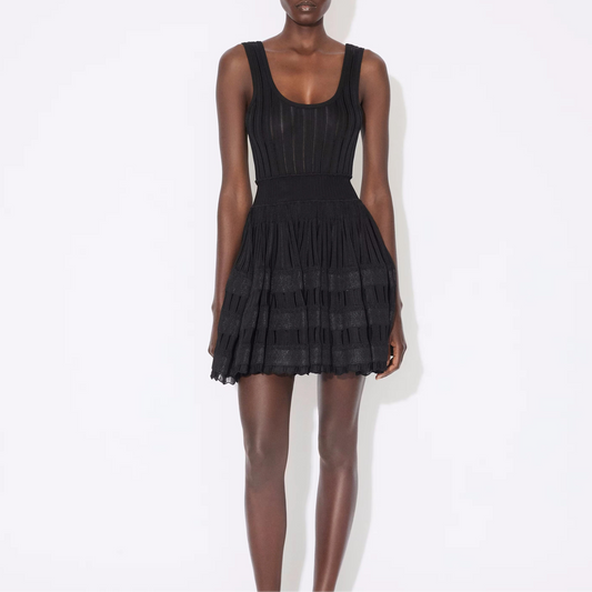 Model wearing fit and flare knit mini dress in black