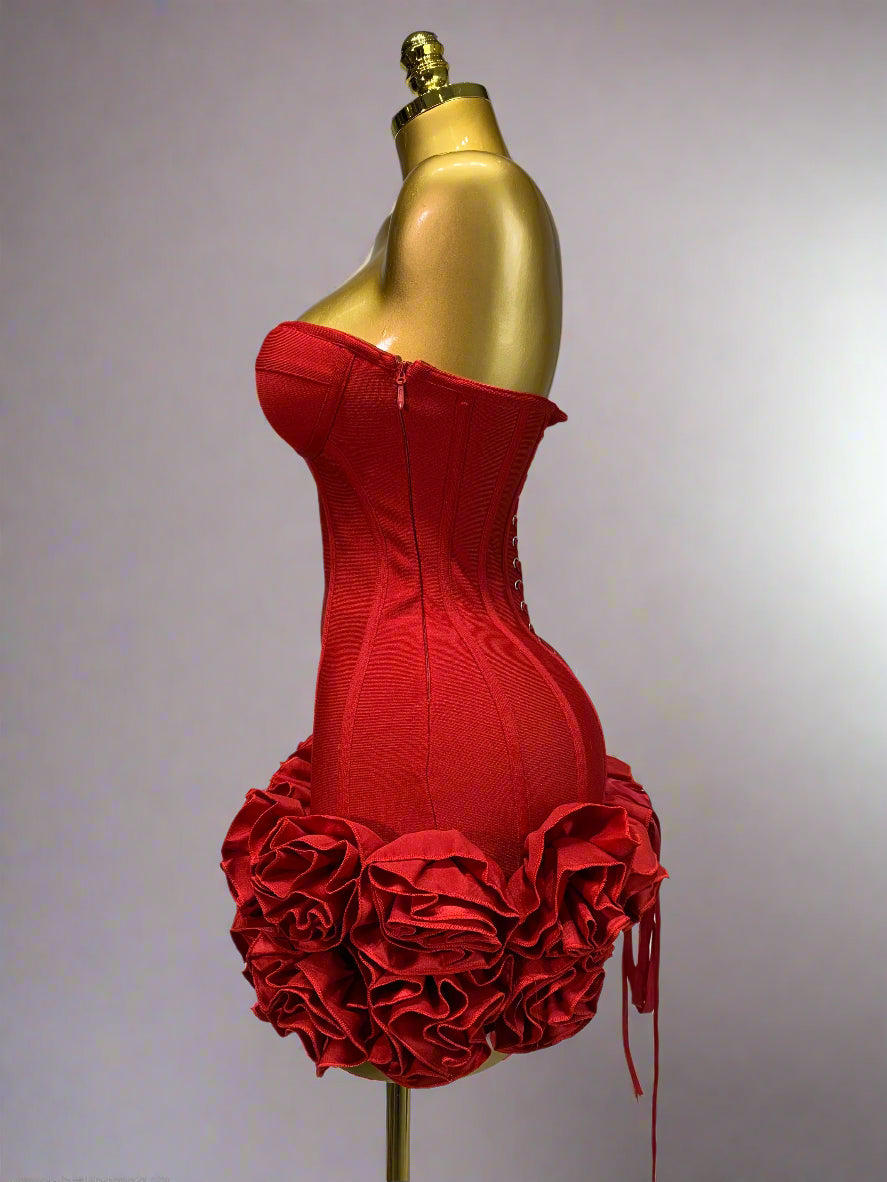 Side view showing rose details along bottom of dress