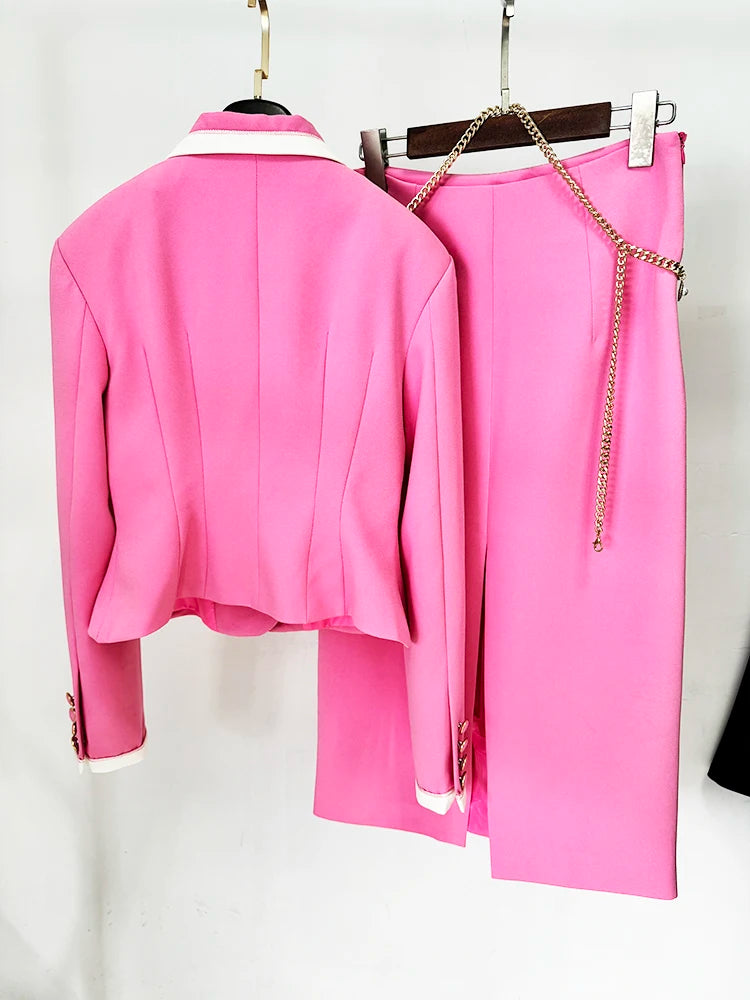 Back view of pink blazer and midi skirt suit set showing professional tailoring details
