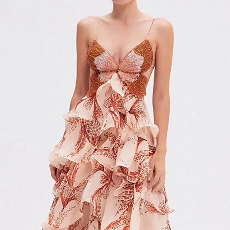 Close-up of butterfly print and ruffle detail