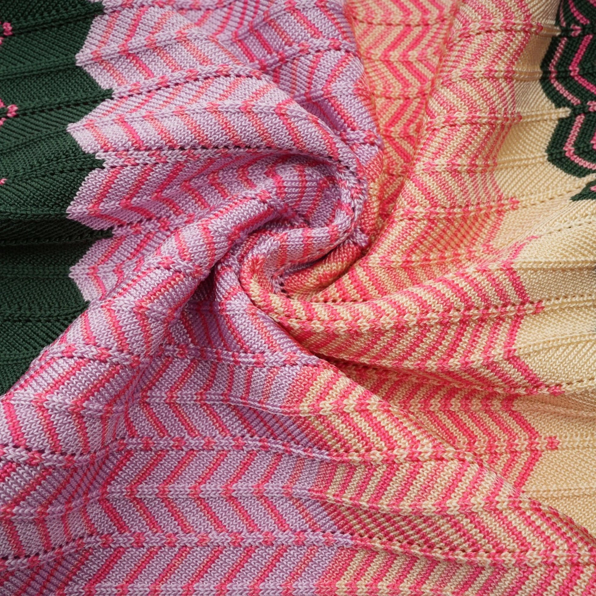 Close-up swatch of chevron knit material