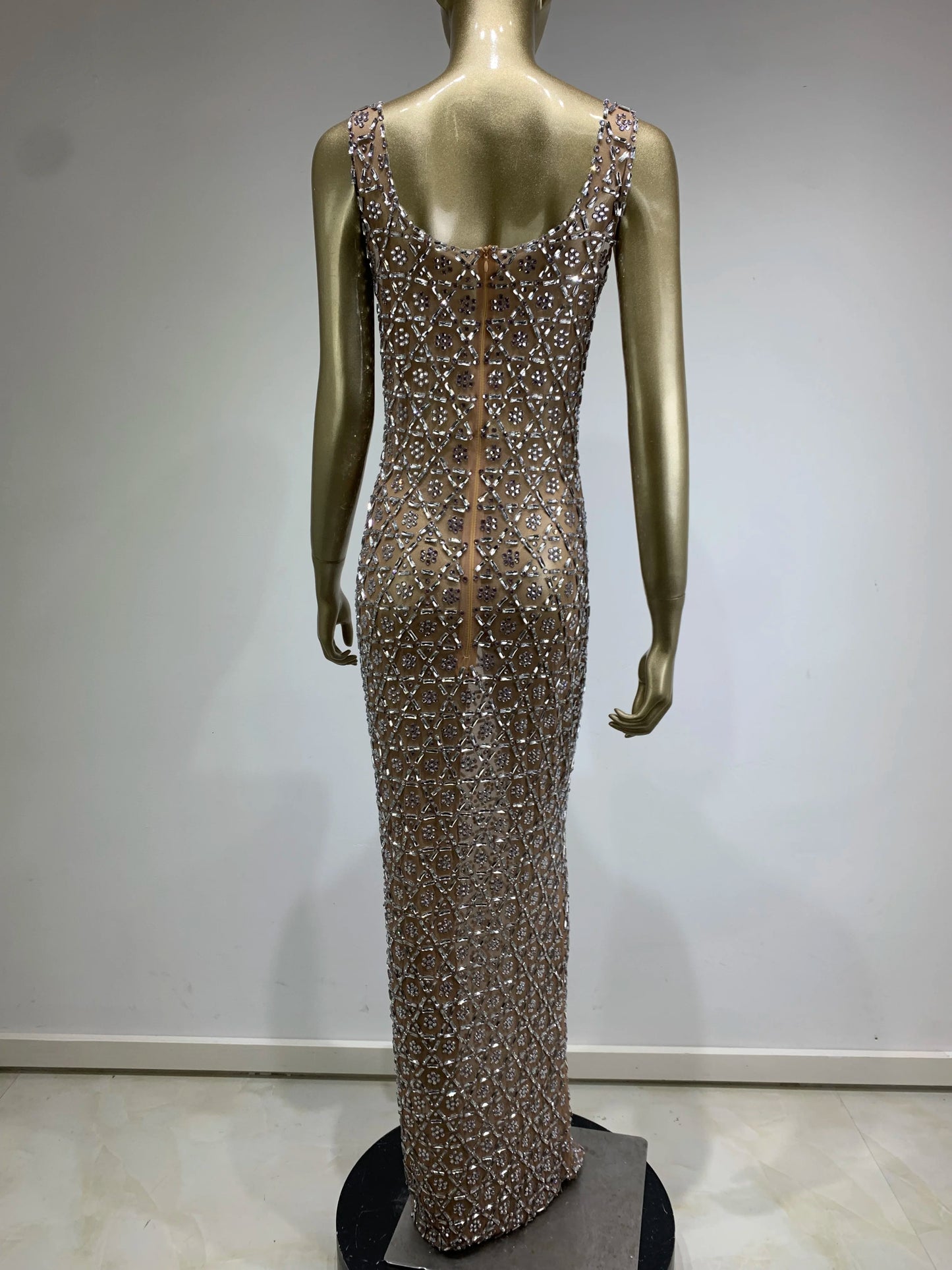 Back view of glam mesh crystal maxi dress showing elegant zipper closure and crystal details