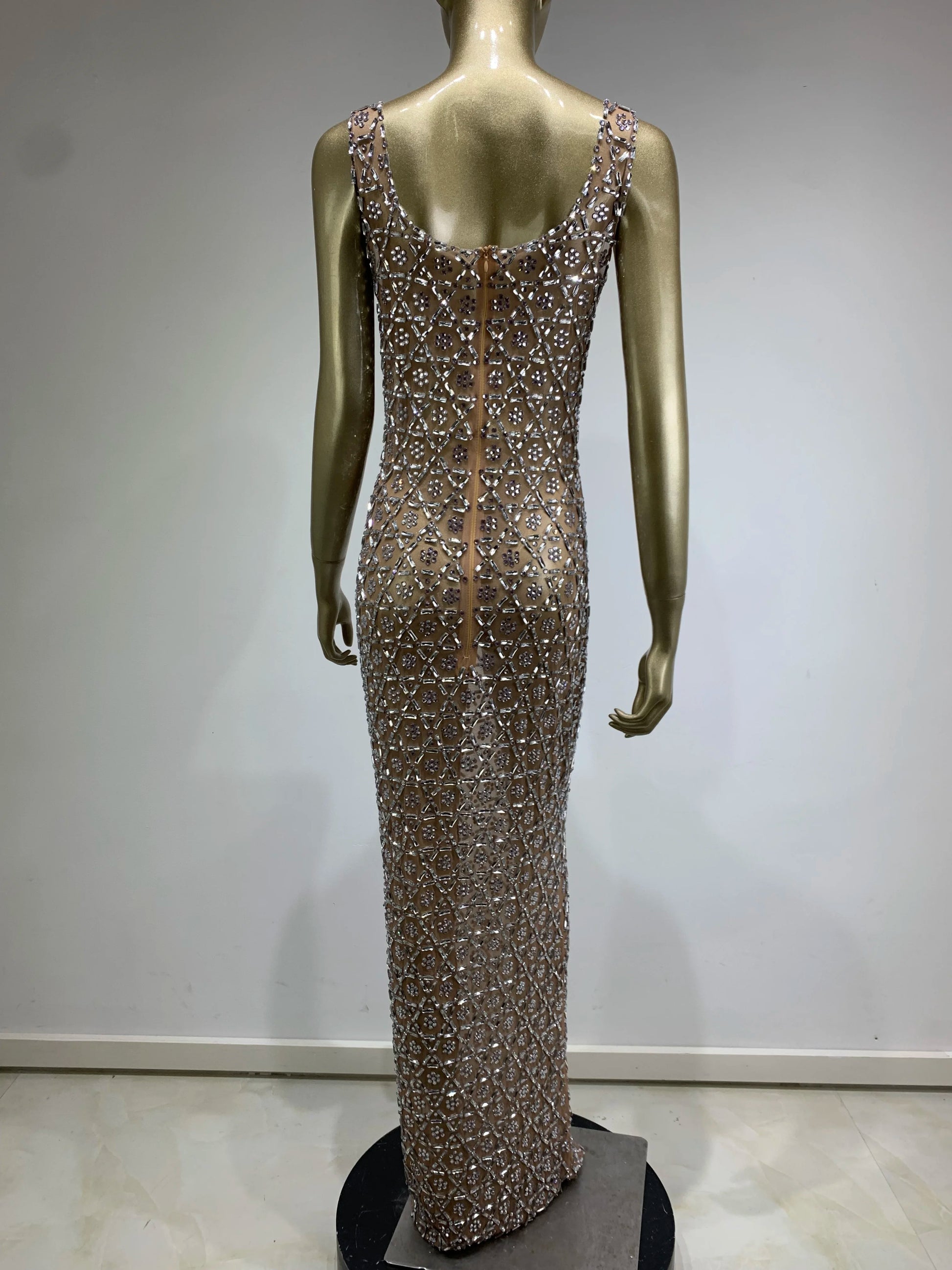Back view of glam mesh crystal maxi dress showing elegant zipper closure and crystal details