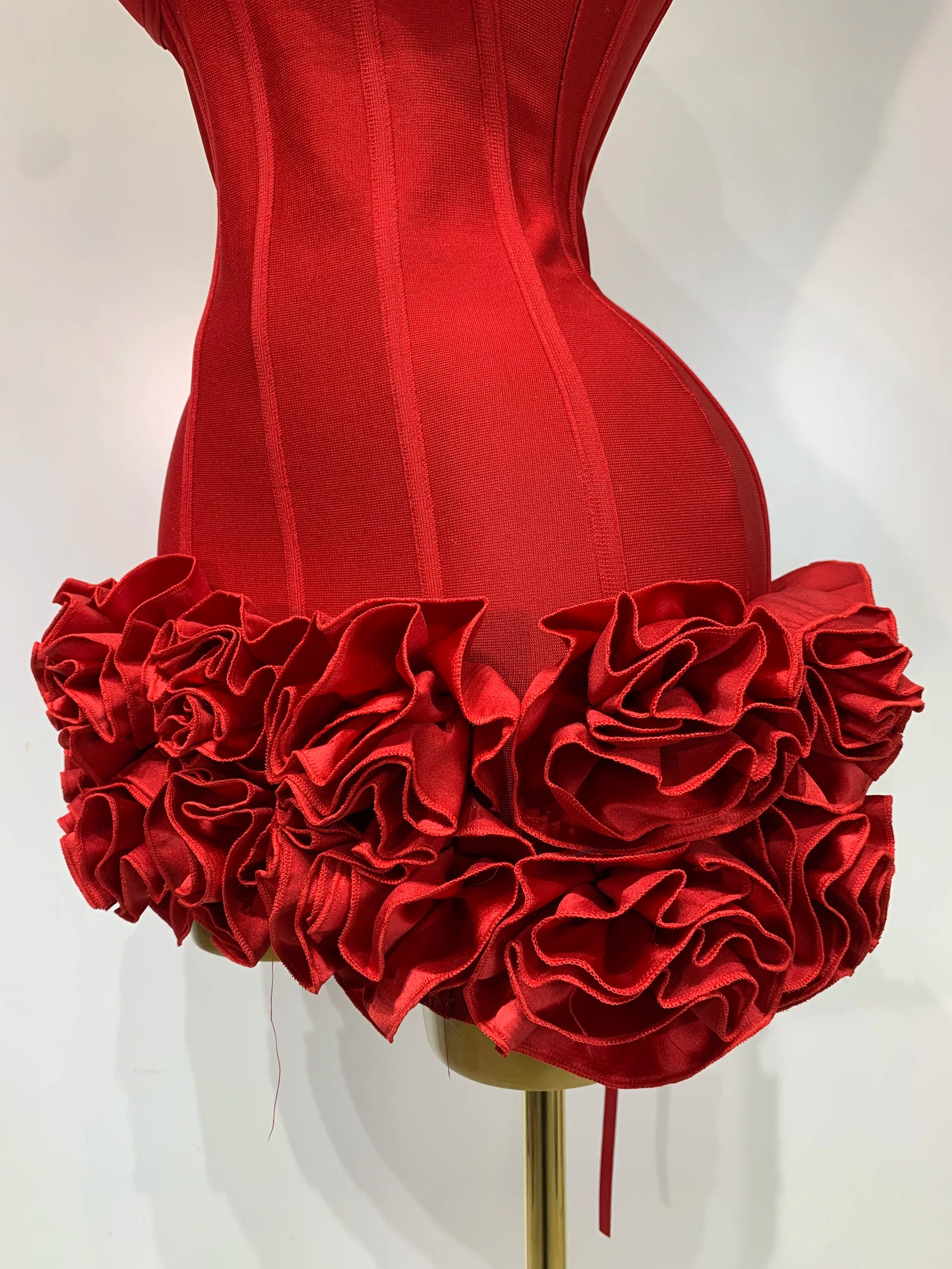Close-up of big rose embellishments on dress hem