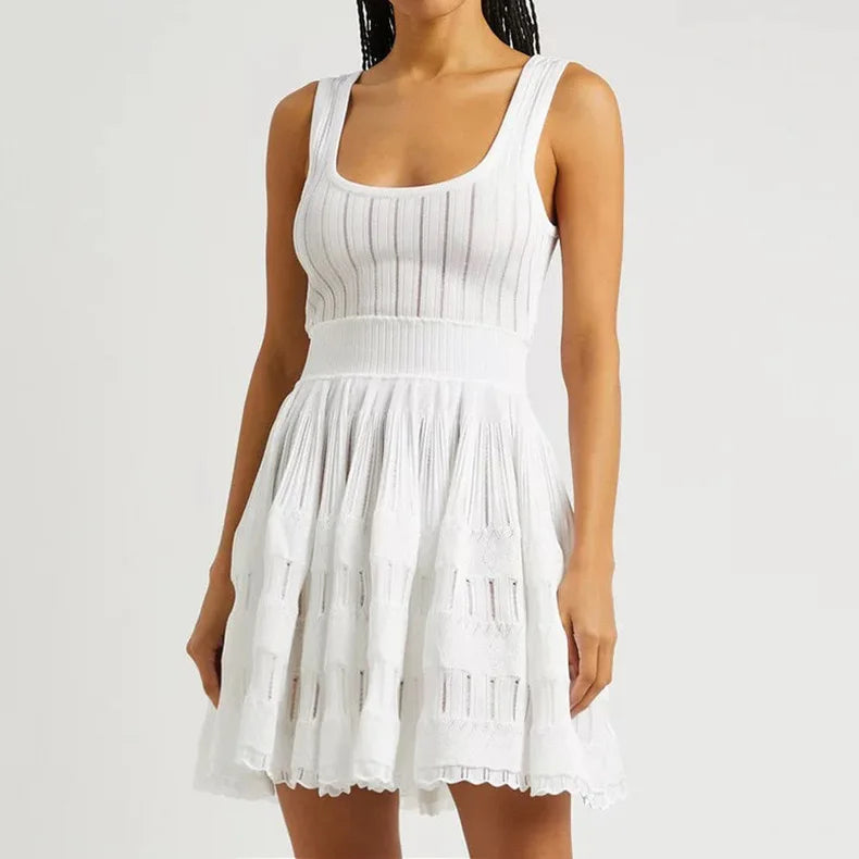 Model wearing fit and flare knit mini dress in white