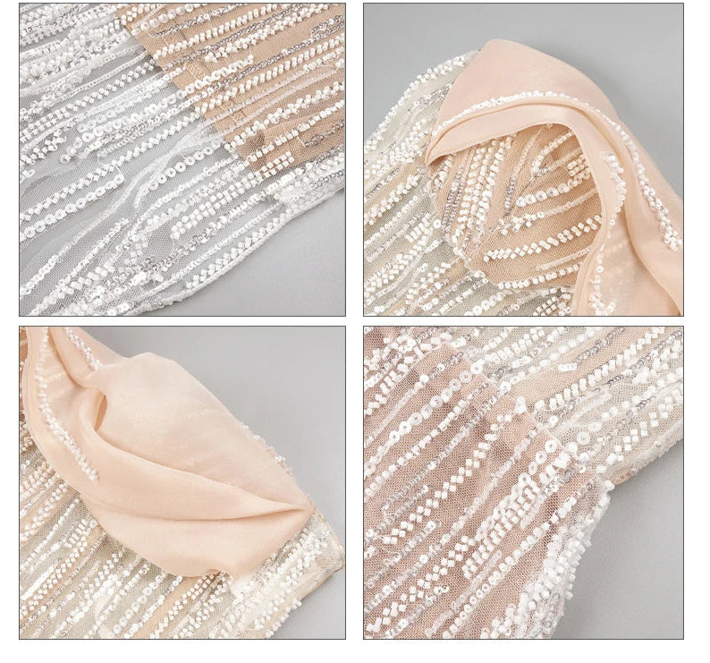 Close-up detail of intricate sequin beading and tassel embellishments on dress fabric